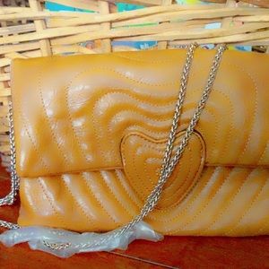 Heart shaped closer, brand new , used for fashion show, gold chain